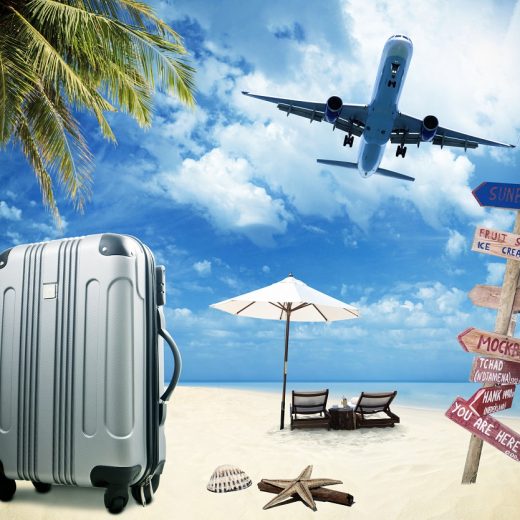 Beach suitcase travel tourism concept